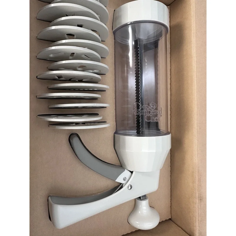 The Pampered Chef 1525 Cookie Press with 16 Discs - White